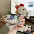 Sleepy Snuggle-saurus Rag Doll Amigurumi Pattern step 4 - final assembly and finishing